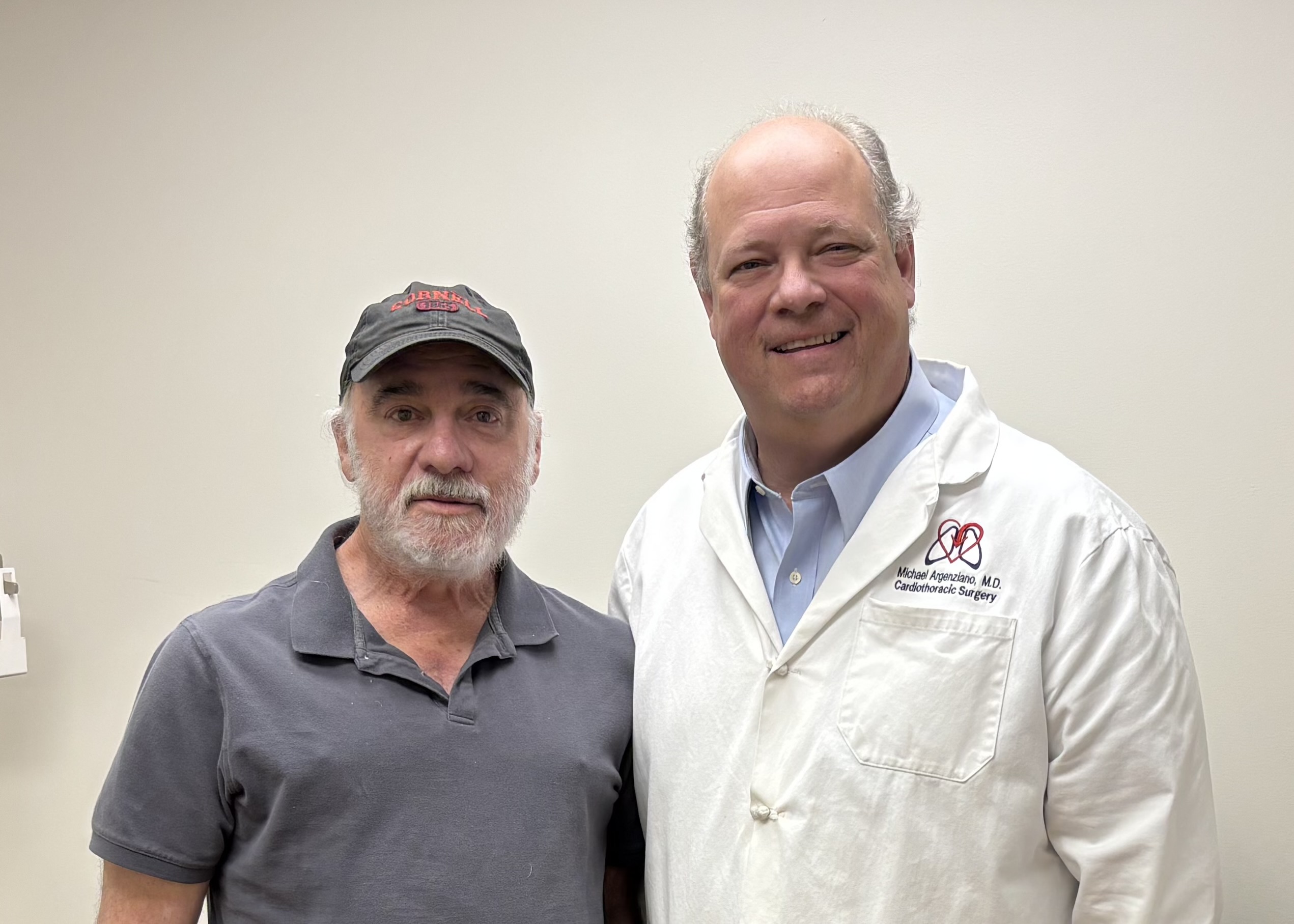 David stands with surgeon Dr. Argenziano