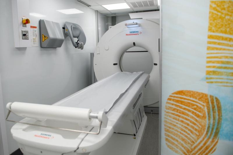a CT machine inside a mobile cancer screening van