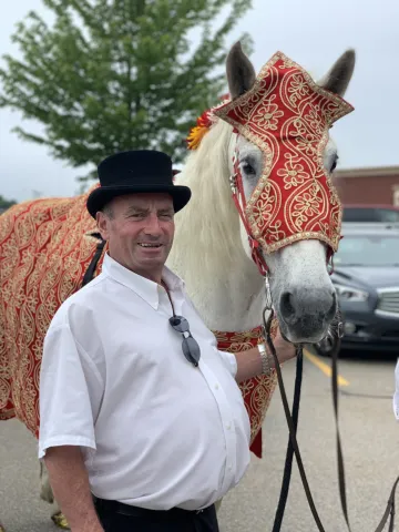 Kieran poses with one of his horses