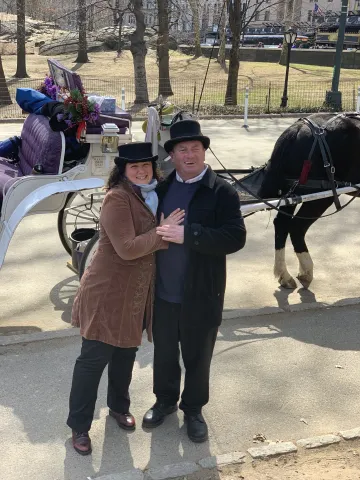 Kieran and his partner Alanna with their carriage in the park.