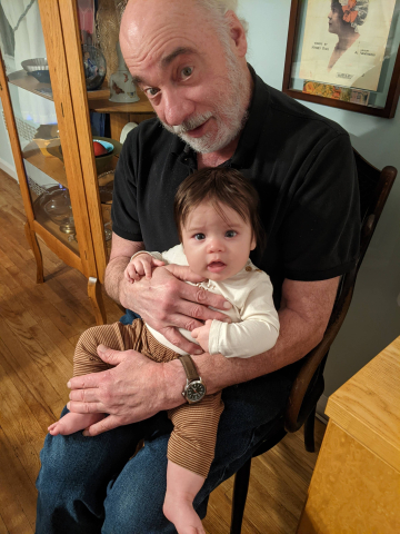 David sits with his grandson