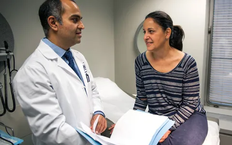 P. Ravi Kiran, MD discussing options with a patient