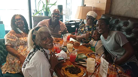 Greer, top left, and Beryl, top-right, celebrate Greer’s birthday with family.