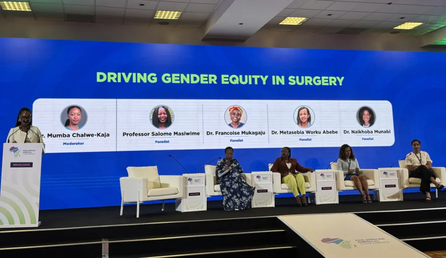 panelist on stage at first surgical pan african conference 
