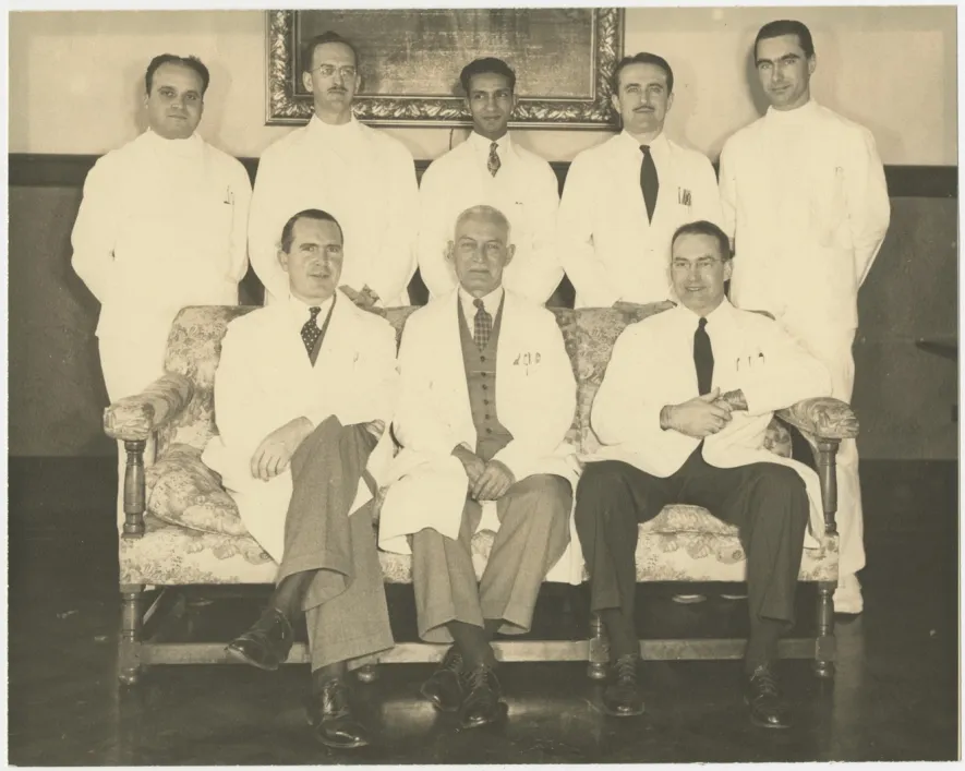 group photo of plastic surgeon Webster and surgeons