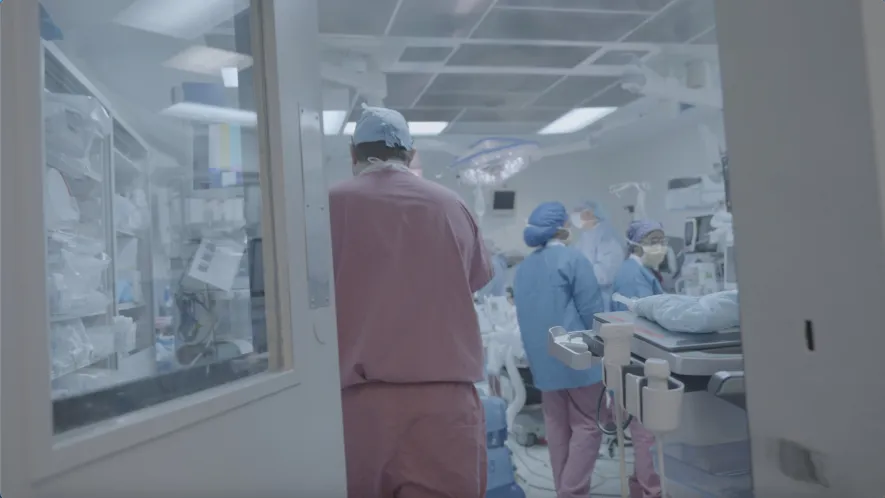 Dr. Hawksworth scrubbing in for surgery.