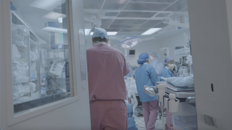 Dr. Hawksworth scrubbing in for surgery.