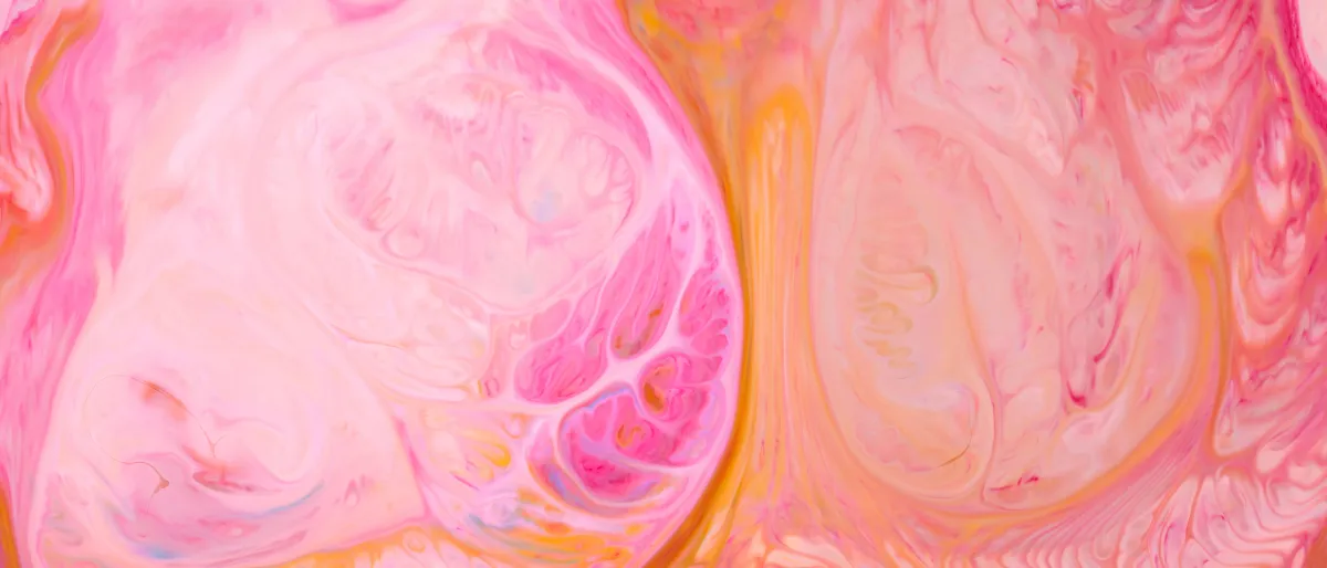 Abstract background with colored spots and stains on the liquid