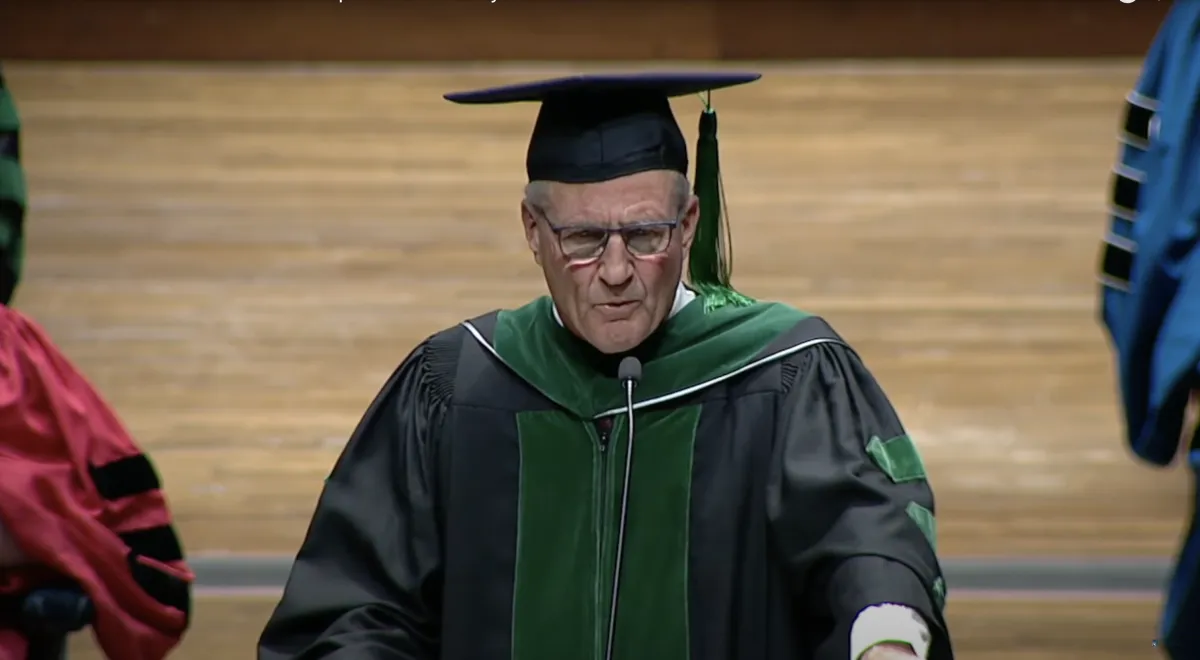 Dr. Craig Smith at the podium 