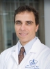 John M. Poneros, MD