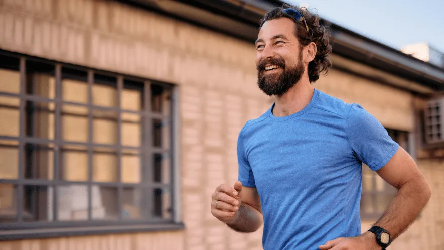 Photo of a middle aged man running