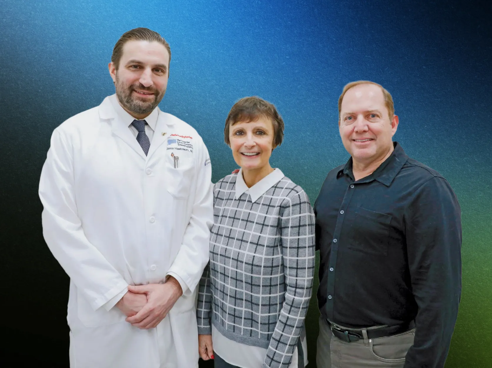 A surgeon stands with patient and patient's spouse