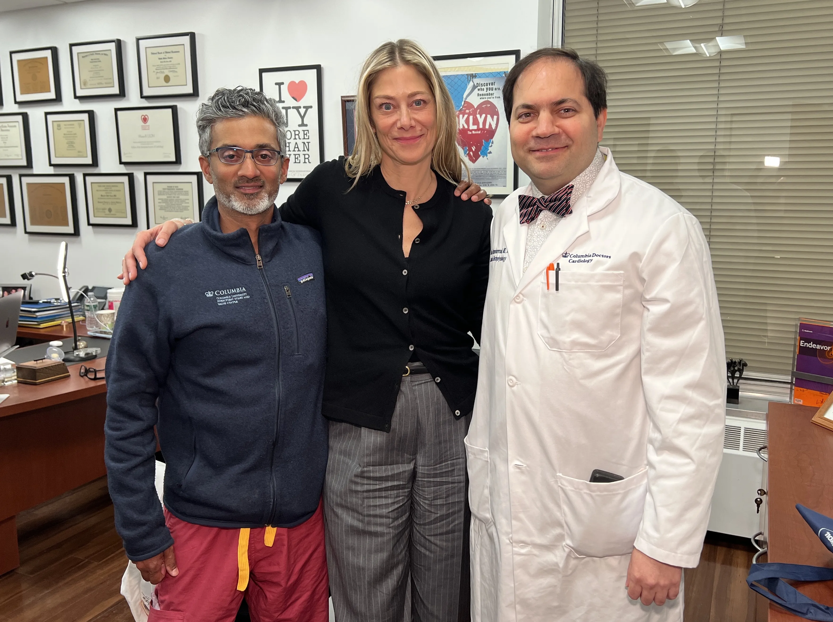 three heart doctors posing together