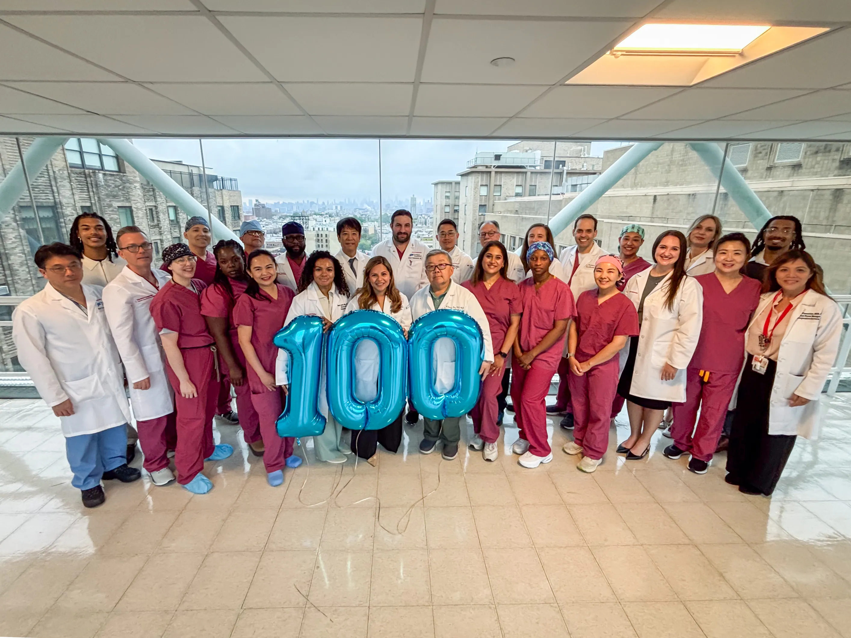 liver team group photo with 100 balloon